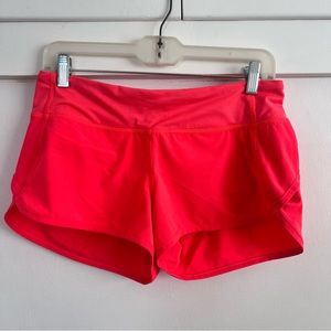 Lululemon neon orange/pink shorts